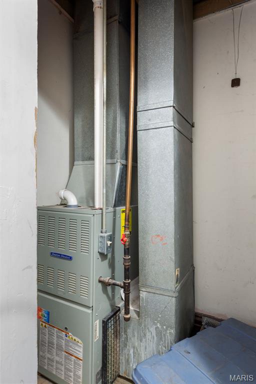 3456 Miami St, Saint Louis, MO 63118 - utility room featuring heating unit