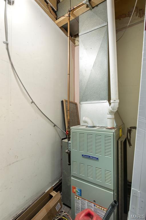 3456 Miami St, Saint Louis, MO 63118 - utility room featuring heating unit