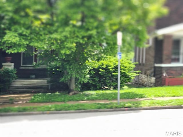 view of home's exterior featuring brick siding