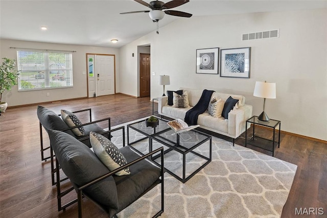 living room featuring vaulted ceiling, ceiling fan, baseboards, wood finished floors, and recessed lighting