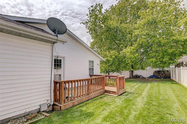 view of yard with a wooden deck