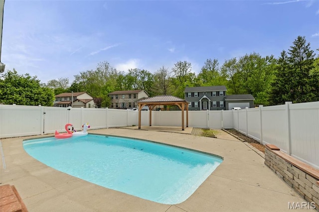 view of pool featuring a gazebo, a patio, and a fenced backyard