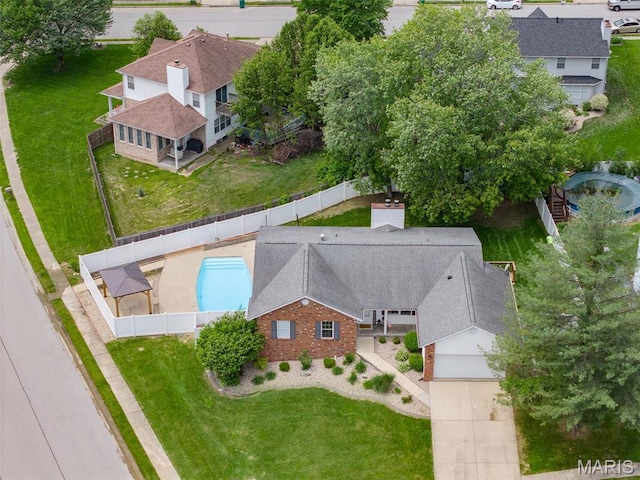 view from above of property featuring a pool area