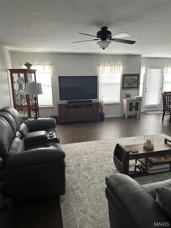 1805 Hyland Green Dr, Ofallon, MO 63366 - living room featuring ceiling fan and wood finished floors