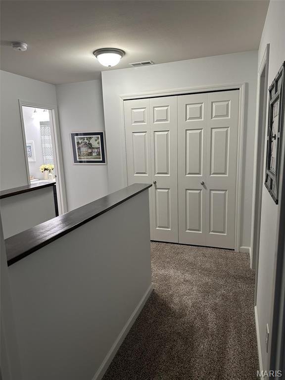 1805 Hyland Green Dr, Ofallon, MO 63366 - hall featuring carpet floors and baseboards