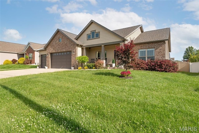 136 Oakshire Dr, Troy, IL 62294 - craftsman inspired home featuring brick siding, an attached garage, covered porch, and driveway