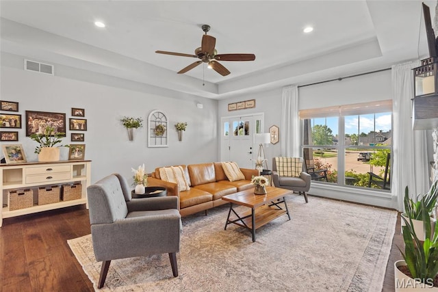 136 Oakshire Dr, Troy, IL 62294 - living room with wood-type flooring, ceiling fan, a tray ceiling, and recessed lighting