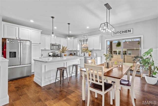 136 Oakshire Dr, Troy, IL 62294 - dining room with recessed lighting and dark wood-style floors