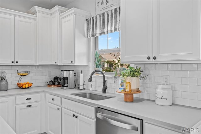 136 Oakshire Dr, Troy, IL 62294 - kitchen with dishwasher, a sink, white cabinets, and light countertops