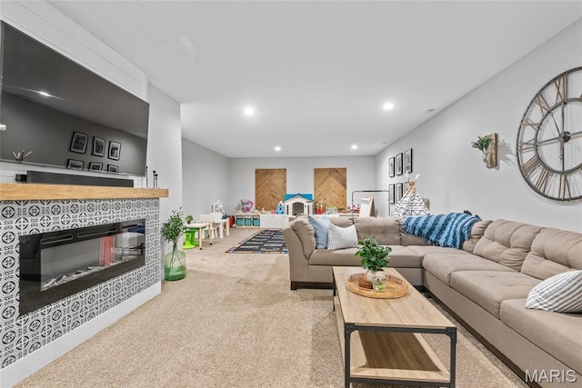136 Oakshire Dr, Troy, IL 62294 - carpeted living area with recessed lighting and a tile fireplace