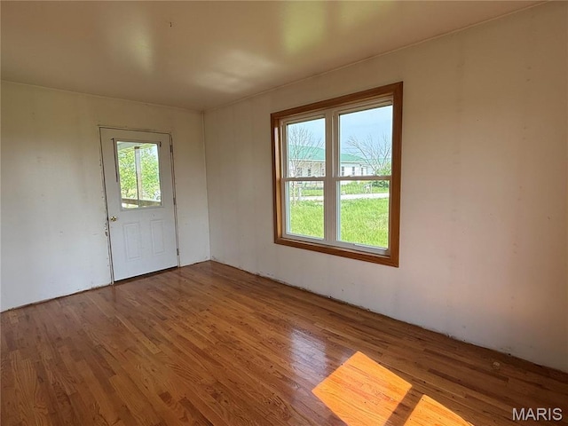 29595 State Highway 3, La Plata, MO 63549 - spare room with wood finished floors