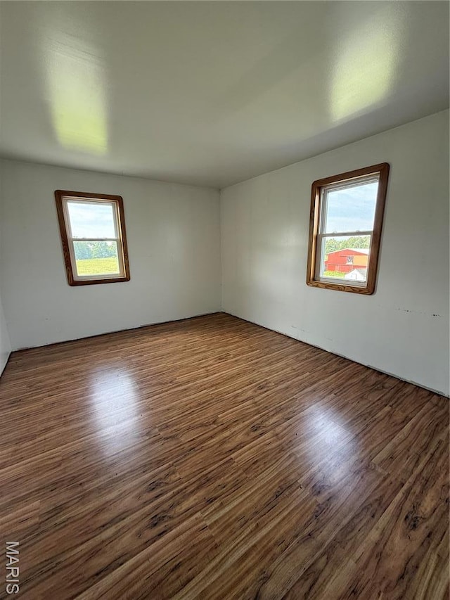 29595 State Highway 3, La Plata, MO 63549 - empty room featuring wood finished floors
