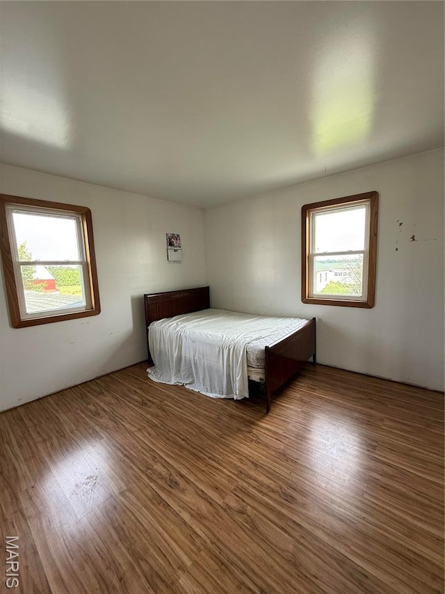 29595 State Highway 3, La Plata, MO 63549 - bedroom with wood finished floors