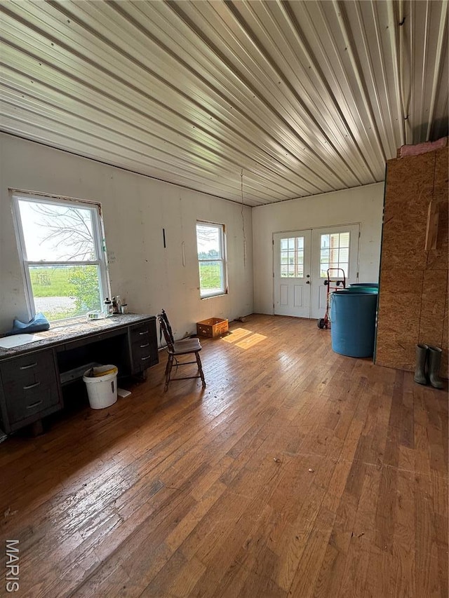 29595 State Highway 3, La Plata, MO 63549 - misc room featuring wood-type flooring