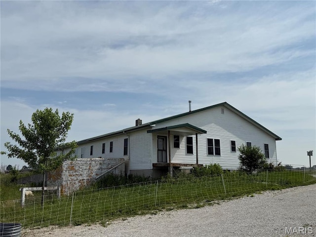 29595 State Highway 3, La Plata, MO 63549 - view of front facade featuring a chimney