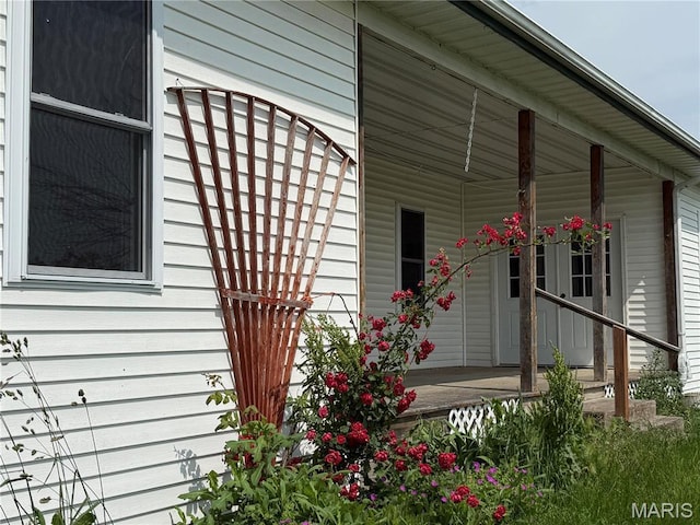 29595 State Highway 3, La Plata, MO 63549 - view of property exterior with covered porch