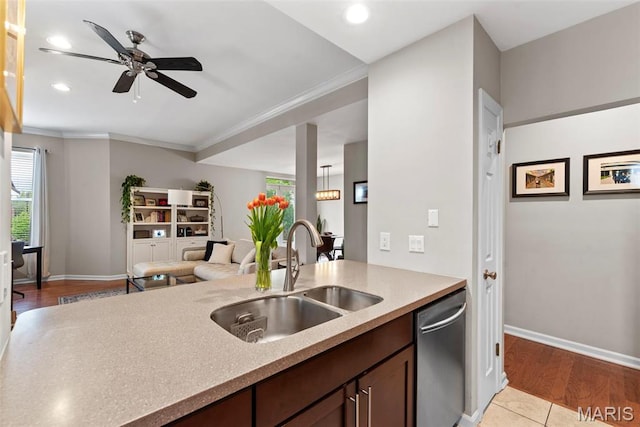 4260 Lindell Blvd Unit B, Saint Louis, MO 63108 - kitchen featuring a sink, stainless steel dishwasher, ceiling fan, healthy amount of natural light, and ornamental molding