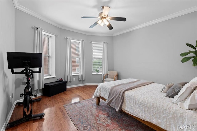 4260 Lindell Blvd Unit B, Saint Louis, MO 63108 - bedroom featuring baseboards, wood finished floors, crown molding, and a ceiling fan