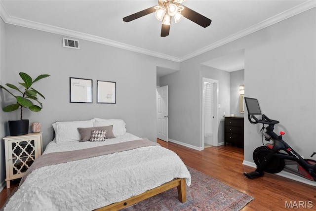4260 Lindell Blvd Unit B, Saint Louis, MO 63108 - bedroom with wood finished floors, crown molding, baseboards, ceiling fan, and ensuite bathroom