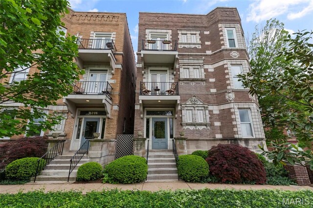 4260 Lindell Blvd Unit B, Saint Louis, MO 63108 - view of front of property featuring a balcony and brick siding