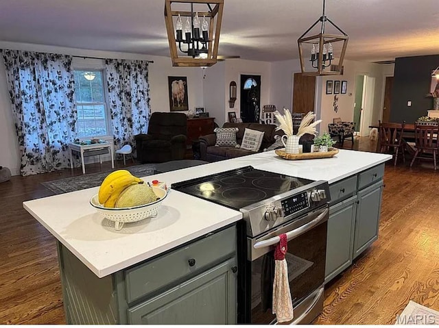 23784 Maries Road 410th Rd, Belle, MO 65013 - kitchen with stainless steel electric range oven, a chandelier, open floor plan, gray cabinets, and light countertops