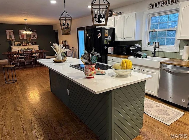 23784 Maries Road 410th Rd, Belle, MO 65013 - kitchen featuring dishwasher, a chandelier, freestanding refrigerator, wood finished floors, and recessed lighting