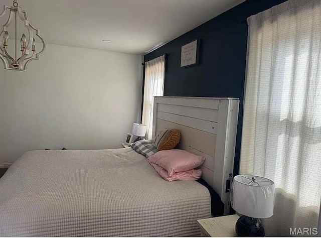 23784 Maries Road 410th Rd, Belle, MO 65013 - bedroom featuring a chandelier
