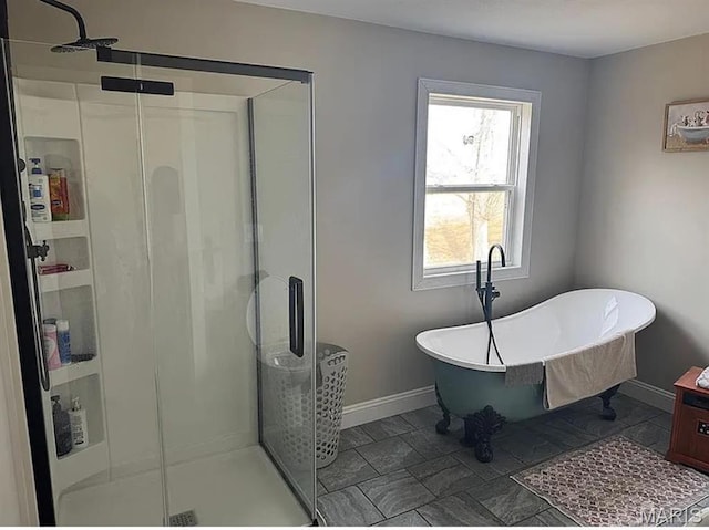 23784 Maries Road 410th Rd, Belle, MO 65013 - full bath with a shower stall, baseboards, and a freestanding tub