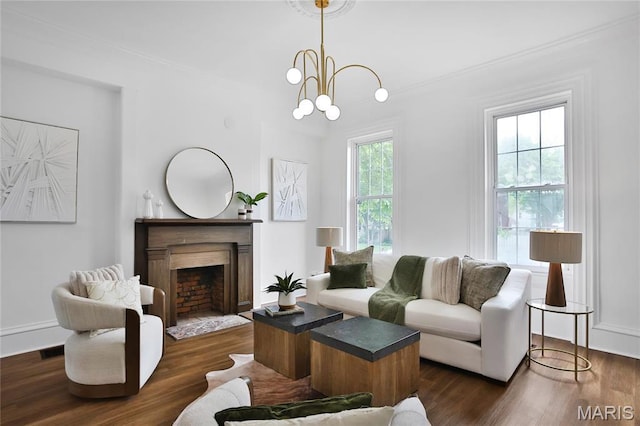 6504 Michigan Ave, Saint Louis, MO 63111 - living room with dark wood-type flooring, a fireplace with flush hearth, and a chandelier