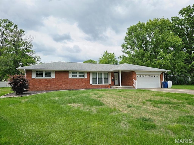 1117 Meadow Ln, Sparta, IL 62286 - ranch-style home featuring a garage, a front yard, concrete driveway, and brick siding
