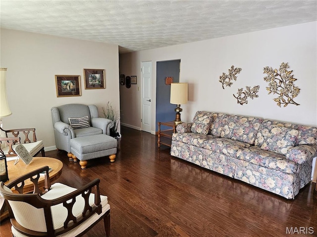 1117 Meadow Ln, Sparta, IL 62286 - living area with wood finished floors, a textured ceiling, and baseboards