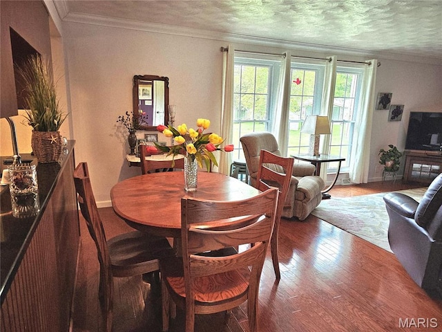 1117 Meadow Ln, Sparta, IL 62286 - dining area with crown molding, wood finished floors, and baseboards
