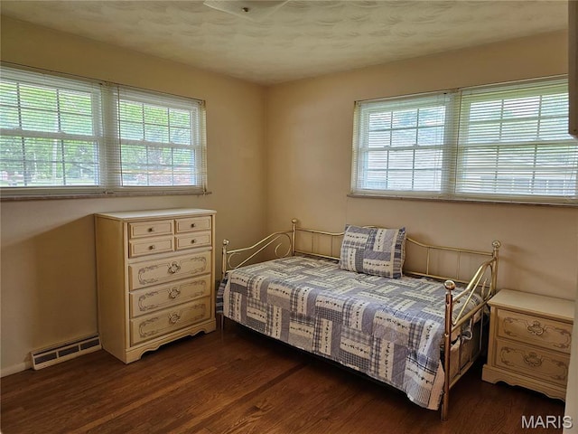 1117 Meadow Ln, Sparta, IL 62286 - bedroom featuring multiple windows and dark wood-type flooring