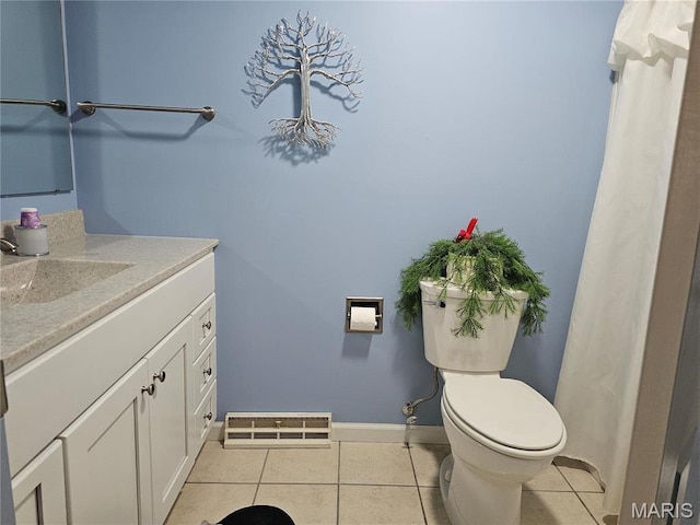 1117 Meadow Ln, Sparta, IL 62286 - bathroom featuring tile patterned floors, vanity, baseboards, and toilet