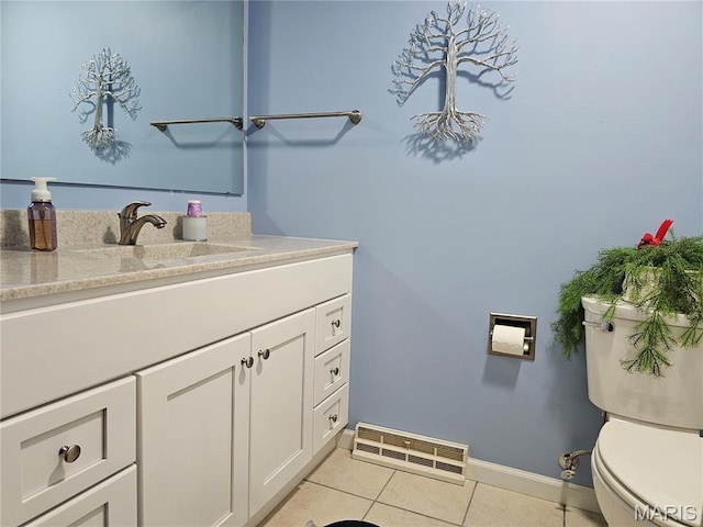 1117 Meadow Ln, Sparta, IL 62286 - half bathroom with tile patterned flooring, vanity, baseboards, and toilet
