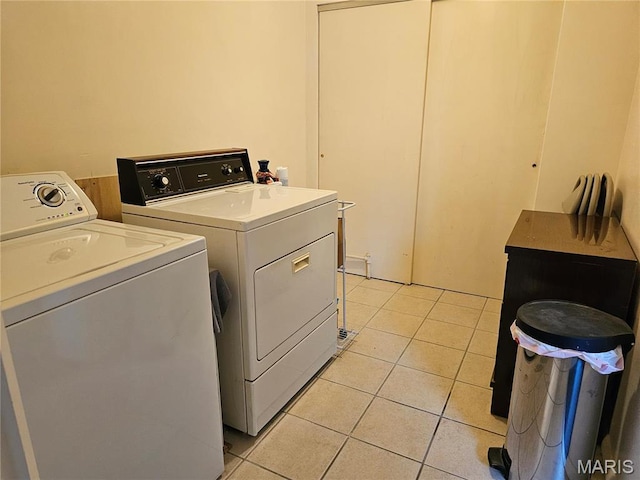 1117 Meadow Ln, Sparta, IL 62286 - laundry room with washer and dryer and light tile patterned floors