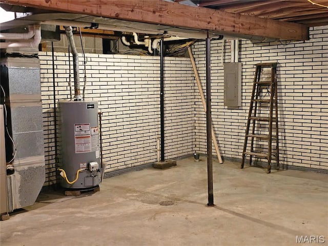 1117 Meadow Ln, Sparta, IL 62286 - unfinished basement with gas water heater, brick wall, and electric panel
