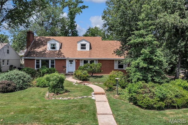 369 Halcyon Dr, Saint Louis, MO 63122 - cape cod home featuring brick siding, a front yard, and a chimney