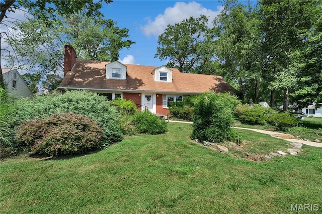 369 Halcyon Dr, Saint Louis, MO 63122 - cape cod home featuring a front lawn and a chimney