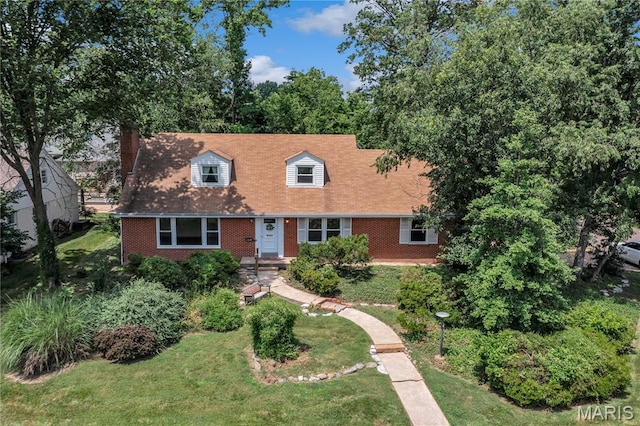 369 Halcyon Dr, Saint Louis, MO 63122 - cape cod-style house with a chimney, brick siding, and a front yard