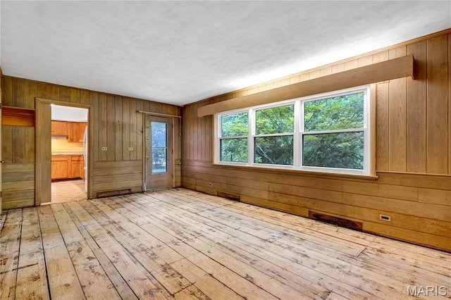 369 Halcyon Dr, Saint Louis, MO 63122 - unfurnished room with wooden walls and wood-type flooring