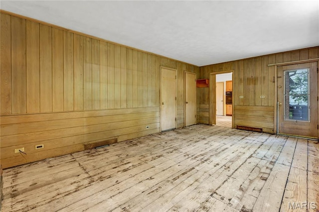 369 Halcyon Dr, Saint Louis, MO 63122 - spare room with wood walls and wood-type flooring