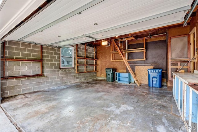 369 Halcyon Dr, Saint Louis, MO 63122 - garage featuring a garage door opener
