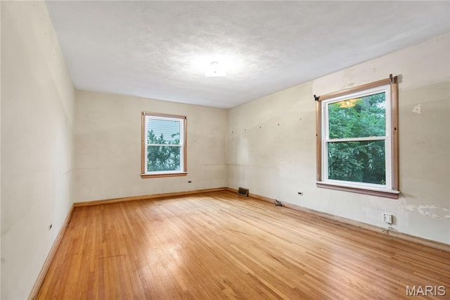369 Halcyon Dr, Saint Louis, MO 63122 - unfurnished room with wood finished floors and baseboards