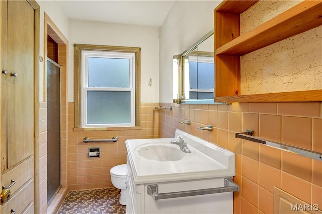 369 Halcyon Dr, Saint Louis, MO 63122 - full bath with a stall shower, tile walls, vanity, and a wainscoted wall