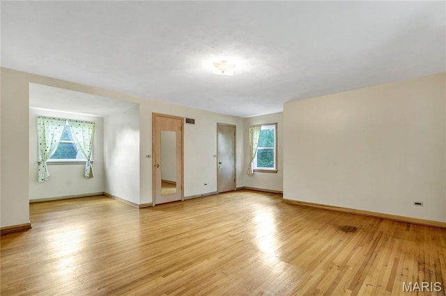 369 Halcyon Dr, Saint Louis, MO 63122 - unfurnished room with light wood-style flooring and baseboards