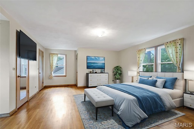 369 Halcyon Dr, Saint Louis, MO 63122 - bedroom featuring light wood-style floors and baseboards