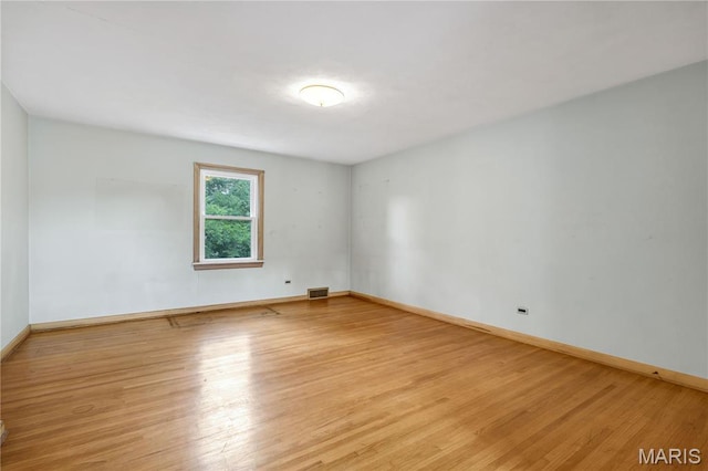 369 Halcyon Dr, Saint Louis, MO 63122 - spare room with wood finished floors and baseboards