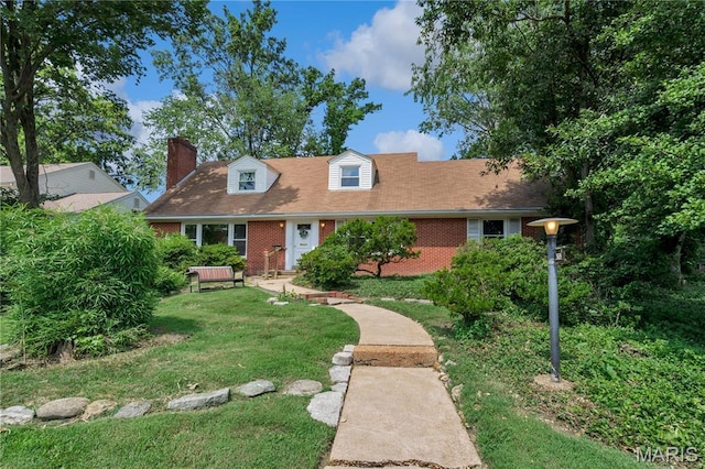 369 Halcyon Dr, Saint Louis, MO 63122 - cape cod-style house with a front yard, brick siding, and a chimney