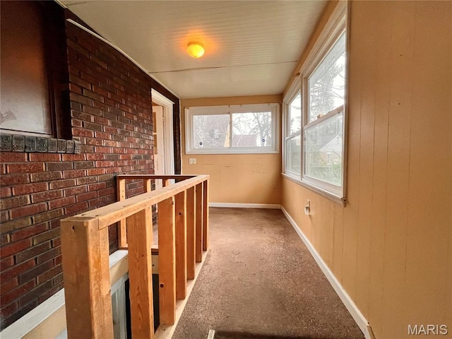 6604 Donald St, Saint Louis, MO 63121 - hallway featuring an upstairs landing and baseboards